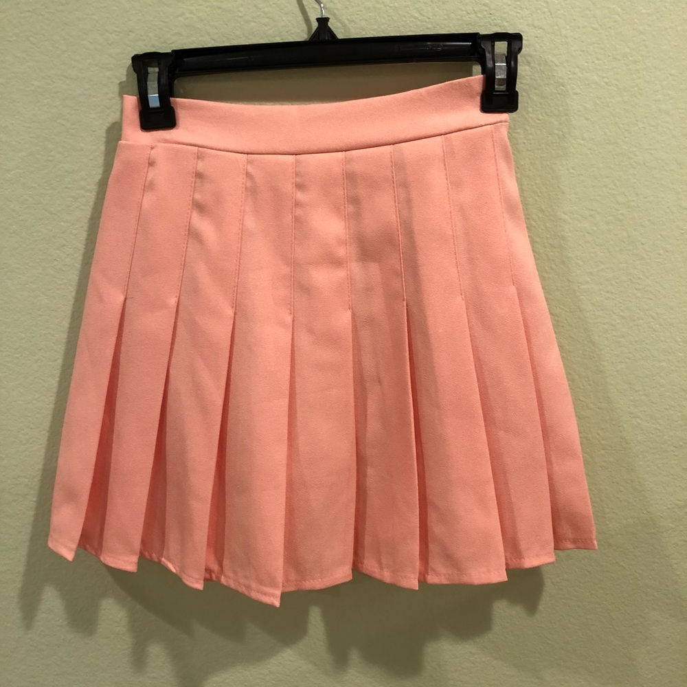 Peach pink pleated tennis skirt